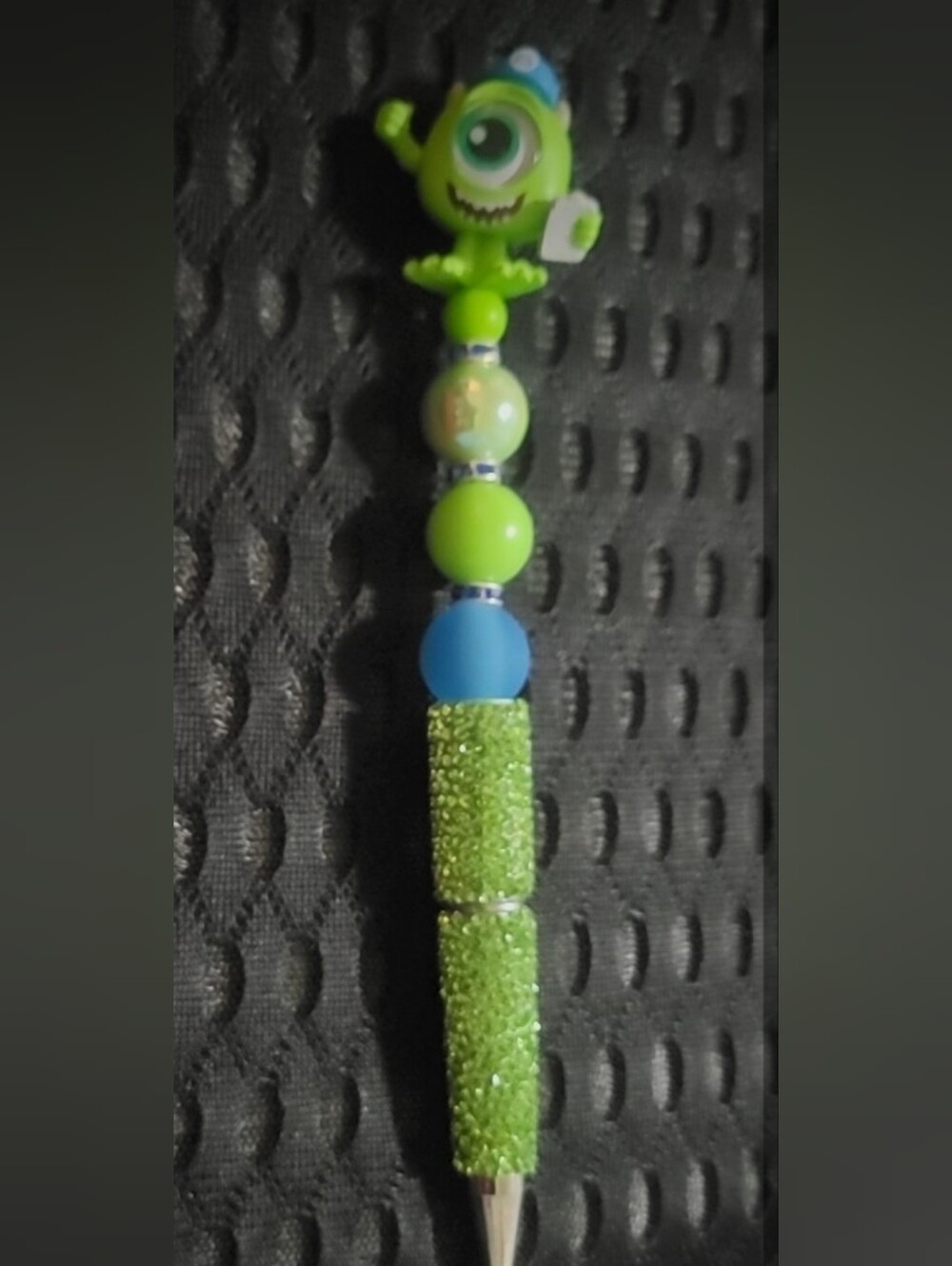 Handmade beaded focal pen features a Disney Doorable Character: Mike Wazowski